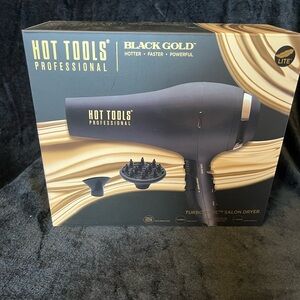Professional hairdryer, black and gold.